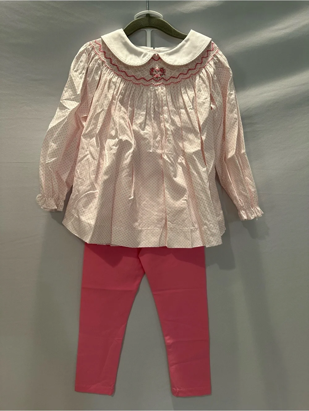 Girls' Pink Smocked Top & Legging Set with Matching Bow.